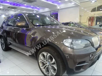 سيارات للبيع بي ام دبليو  الفئة - اكس  5  150,000  بني  اس يو في  اتوماتك  دفع رباعي  جلد  2011  8  نعم  بنزين
