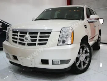 Cars For Sale Cadillac  Escalade  60,488  White  SUV  Automatic  4WD  Leather  2010  8  Yes  Gasoline