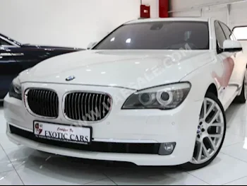 Cars For Sale BMW  7-Series  750 Li  79,000  White  Sedan  Automatic  RWD  Leather  2011  8  Yes  Gasoline