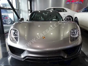 سيارات للبيع بورش  918  سبايدر  1,000  فضي  كوبيه \ سبورت  اف - 1  دفع خلفي  شامواه  2015  8  كلا  هايبرد