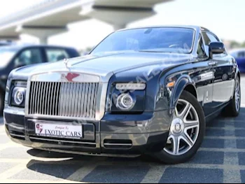 Cars For Sale Rolls-Royce  Phantom  Coupe  11,000  Gray  Coupe / Sport  Automatic  AWD  Leather  2010  12  No  Gasoline