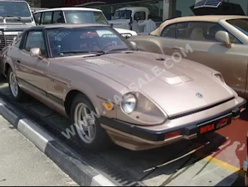 سيارات للبيع داتسون  240  زد  50,000  ذهبي  كلاسك  عادي  دفع خلفي  جلد  1983  6  كلا  بنزين