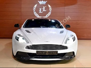 Cars For Sale Aston Martin  Vanquish  14,200  White  Coupe / Sport  Automatic  RWD  Leather  2014  12  No  Gasoline