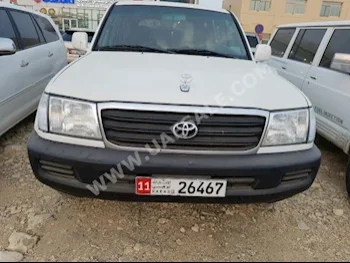 Cars For Sale Toyota  Land Cruiser  GX  440,000  Gray  Sedan  Manual  4WD  Leather / Cloth  2001  6  No  Gasoline