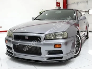 Cars For Sale Nissan  Skyline  89,781  Gray  Coupe / Sport  Manual  AWD  Cloth  2001  6  No  Gasoline