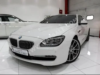Cars For Sale BMW  6-Series  650i  38,078  White  Coupe / Sport  Tiptronic  RWD  Leather  2012  8  Panorama  Gasoline