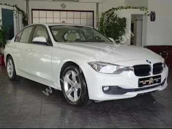 Cars For Sale BMW  3-Series  320i  71,000  White  Sedan  Automatic  RWD  Leather  2012  4  No  Gasoline