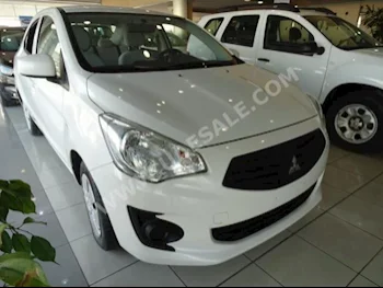 Cars For Sale Mitsubishi  Attrage  48,000  White  Sedan  Automatic  FWD  Cloth  2014  4  No  Gasoline
