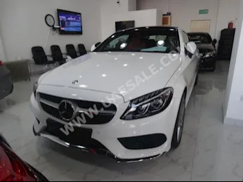 Cars For Sale Mercedes-Benz  C-Class  250  18,000  White  Coupe / Sport  Automatic  RWD  Leather  2017  4  Panorama  Gasoline