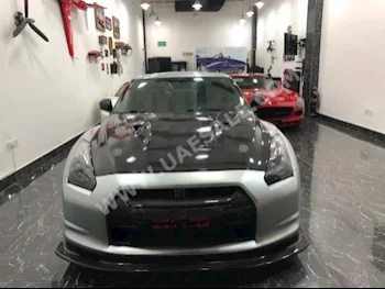 Cars For Sale Nissan  GT-R  R35  10,000  Silver  Coupe / Sport  Automatic  RWD  Leather  2009  6  Yes  Gasoline
