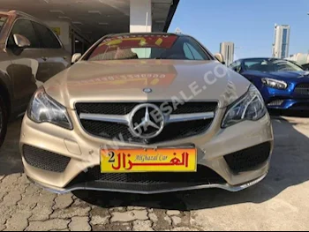 Cars For Sale Mercedes-Benz  E-Class  250  23,000  Gold  Coupe / Sport  Automatic  RWD  Leather  2016  6  Panorama  Gasoline