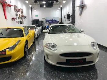 Cars For Sale Jaguar  XK  140,000  White  Coupe / Sport  Automatic  RWD  Leather  2010  6  Yes  Gasoline