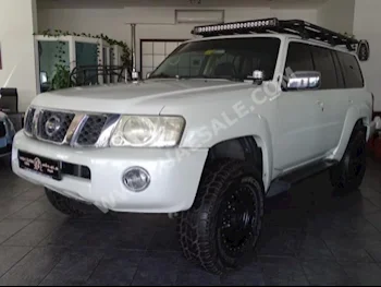 Cars For Sale Nissan  Patrol  Safari  92,000  White  SUV  Automatic  4WD  Leather  2007  6  Yes  Gasoline