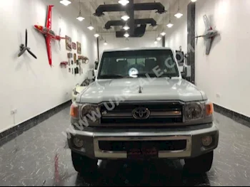 Cars For Sale Toyota  Land Cruiser  LX  54,000  Silver  Pick Up  Manual  4WD  Cloth  2013  6  No  Gasoline
