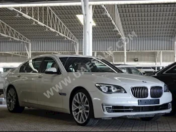 Cars For Sale BMW  7-Series  750 Li  102,000  White  Sedan  Automatic  RWD  Leather  2014  8  Yes  Gasoline
