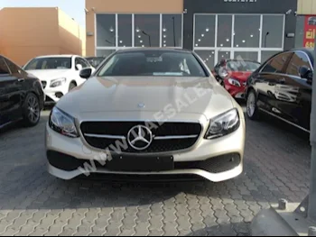 Cars For Sale Mercedes-Benz  E-Class  200  14,000  Gold  Coupe / Sport  Automatic  RWD  Leather  2017  4  Panorama  Gasoline