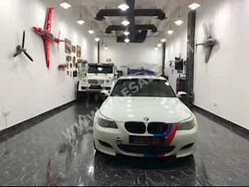 Cars For Sale BMW  M-Series  5  195,000  White  Sedan  Automatic  RWD  Leather  2006  4  Yes  Gasoline