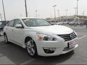 Cars For Sale Nissan  Altima  2.5 SV  100,000  White  Sedan  Automatic  FWD  Cloth  2014  4  No  Gasoline