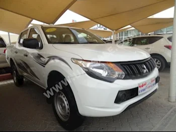 Cars For Sale Mitsubishi  L 200  200,000  White  Pick Up  Manual  4WD  Cloth  2016  4  No  Gasoline