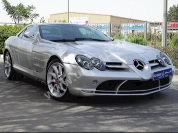 Cars For Sale Mercedes-Benz  SLR  Mclaren  22,000  Silver  Coupe / Sport  F-1  AWD  Leather  2005  12  No  Gasoline