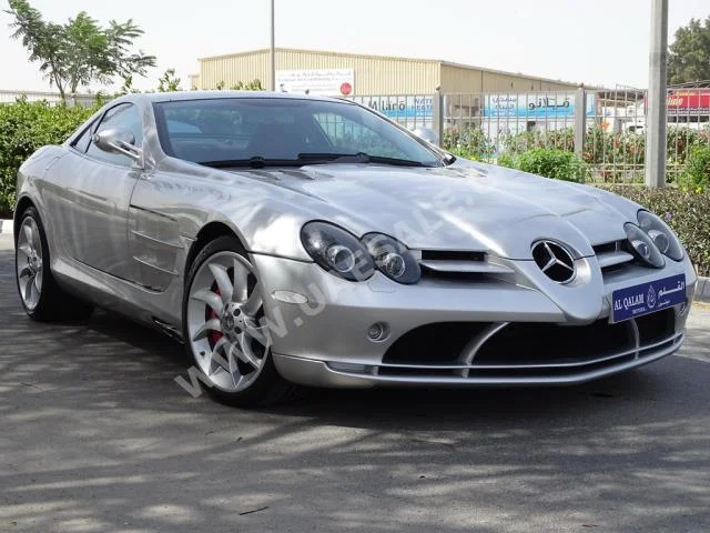 Cars For Sale Mercedes-Benz  SLR  Mclaren  22,000  Silver  Coupe / Sport  F-1  AWD  Leather  2005  12  No  Gasoline