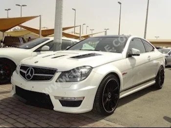 Cars For Sale Mercedes-Benz  C-Class  63 AMG  146,000  White  Coupe / Sport  Automatic  RWD  Leather  2013  8  Panorama  Gasoline