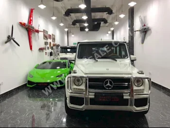 Cars For Sale Mercedes-Benz  G-Class  55 AMG  63,000  White  SUV  Automatic  4WD  Leather  2011  8  Yes  Gasoline