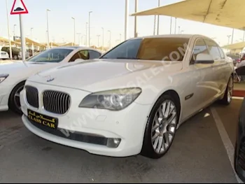 Cars For Sale BMW  7-Series  750 Li  138,000  White  Sedan  Automatic  RWD  Leather  2011  8  Yes  Gasoline