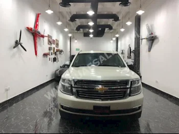 Cars For Sale Chevrolet  Tahoe  LTZ  50,000  White  SUV  Automatic  4WD  Leather  2015  8  Yes  Gasoline