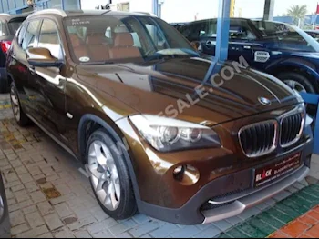 Cars For Sale BMW  X-Series  1  99,000  Brown  SUV  Automatic  AWD  Leather  2011  4  Panorama  Gasoline