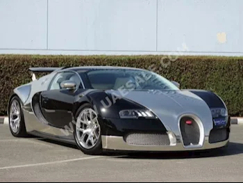 Cars For Sale Bugatti  Veyron  Centenaire  1,500  Black & Silver  Coupe / Sport  F-1  AWD  Leather  2010  16  No  Gasoline