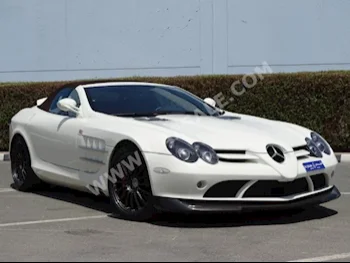 Cars For Sale Mercedes-Benz  SLR  722 S  2,500  White  Coupe / Sport  F-1  RWD  Leather/Chamois  2009  12  No  Gasoline