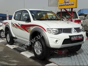 Cars For Sale Mitsubishi  L 200  0  White  Pick Up  Automatic  4WD  Leather  2013  4  No  Gasoline