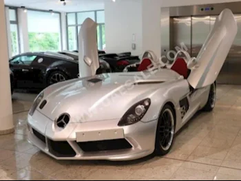 Cars For Sale Mercedes-Benz  SLR  Mansoory  0  Silver  Coupe / Sport  Automatic  RWD  Leather  2009  8  No  Gasoline