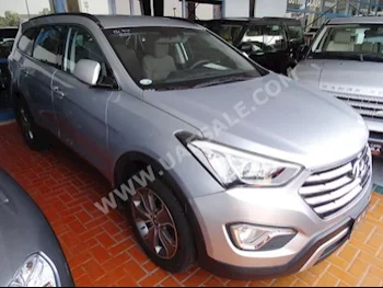 Cars For Sale Hyundai  Santa Fe  Grand  62,000  Silver  SUV  Automatic  4WD  Cloth  2015  6  No  Gasoline