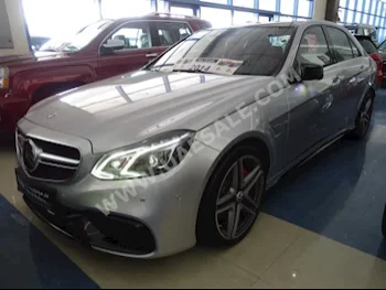 Cars For Sale Mercedes-Benz  E-Class  63 AMG  70,000  Gray  Sedan  Automatic  AWD  Leather  2014  8  Panorama  Gasoline