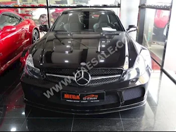 سيارات للبيع مرسيدس - بنز  اس ال - كلاس  65 AMG  10,000  أسود  كوبيه \ سبورت  تبترونك  دفع خلفي  جلد  2009  8  كلا  بنزين