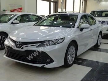 Cars For Sale Toyota  Camry  GLE  0  White  Sedan  Automatic  FWD  Cloth  2018  4  Yes  Gasoline