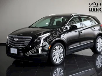 Cars For Sale Cadillac  XT5  premium luxury  24,500  Black  SUV  Automatic  4WD  Leather  2017  6  Panorama  Gasoline