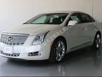 Cars For Sale Cadillac  XTS  Platinum  72,666  White  Sedan  Automatic  FWD  Leather  2013  6  Yes  Gasoline
