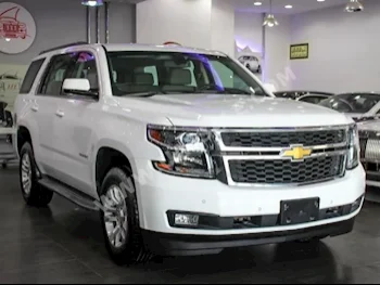 Cars For Sale Chevrolet  Tahoe  60,700  White  SUV  Automatic  4WD  Cloth  2015  8  No  Gasoline
