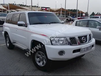 Cars For Sale Nissan  Patrol  Safari  60,000  White  Pick Up  Automatic  4WD  Cloth  2016  6  Yes  Gasoline