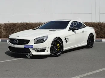 Cars For Sale Mercedes-Benz  CL-Class  63 AMG  82,000  White  Convertible  Automatic  RWD  Leather  2013  8  Yes  Gasoline