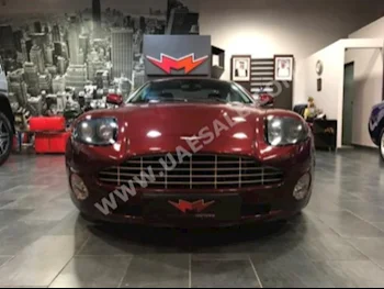 Cars For Sale Aston Martin  Vanquish  32,000  Maroon  Coupe / Sport  F-1  RWD  Leather/Chamois  2002  12  No  Gasoline