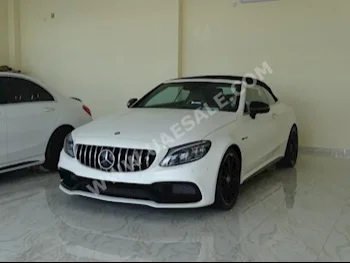 Cars For Sale Mercedes-Benz  C-Class  63 AMG  21,771  White  Coupe / Sport  Automatic  RWD  Leather  2017  8  No  Gasoline
