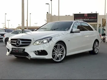 Cars For Sale Mercedes-Benz  E-Class  300 AMG  66,000  White  Sedan  Automatic  RWD  Leather  2016  6  Panorama  Gasoline