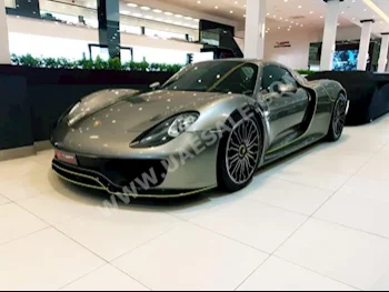 سيارات للبيع بورش  918  سبايدر  5,000  رمادي  كوبيه \ سبورت  اتوماتك  دفع كلي مستمر  جلد  2015  6  كلا  بنزين