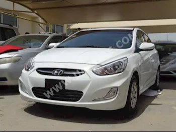 Cars For Sale Hyundai  Accent  130,000  White  Sedan  Automatic  FWD  Cloth  2015  4  No  Gasoline