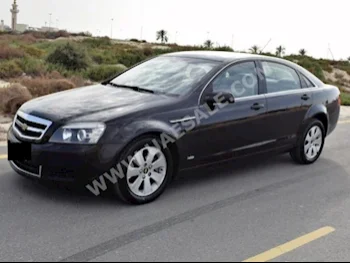 Cars For Sale Chevrolet  Caprice  LS  15,000  Black  Sedan  Automatic  RWD  Cloth  2012  6  Yes  Gasoline
