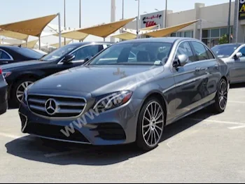 Cars For Sale Mercedes-Benz  E-Class  300  18,000  Gray  Sedan  Automatic  RWD  Leather  2017  4  Panorama  Gasoline